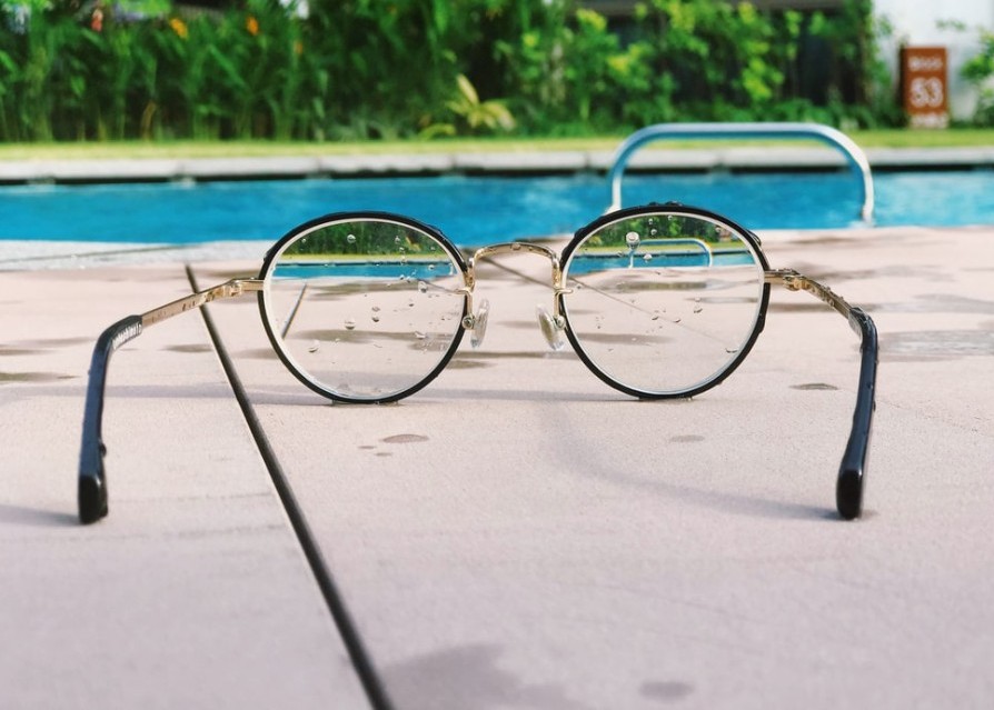 Glasses sitting by the pool