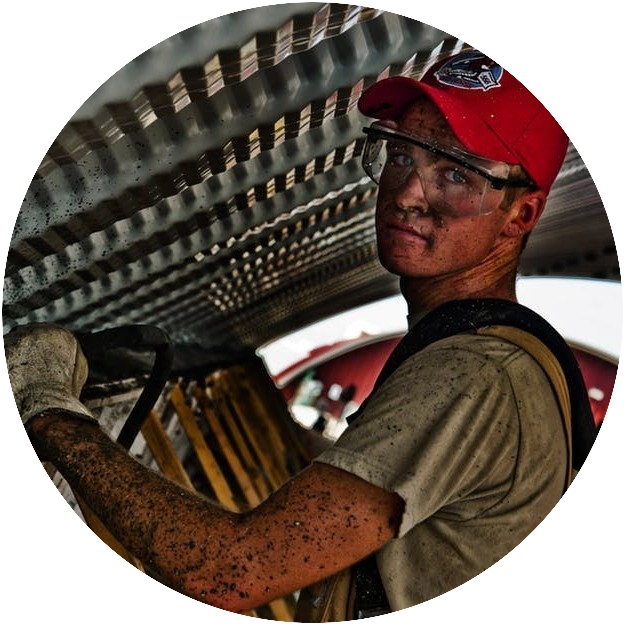 Man working with safety glasses